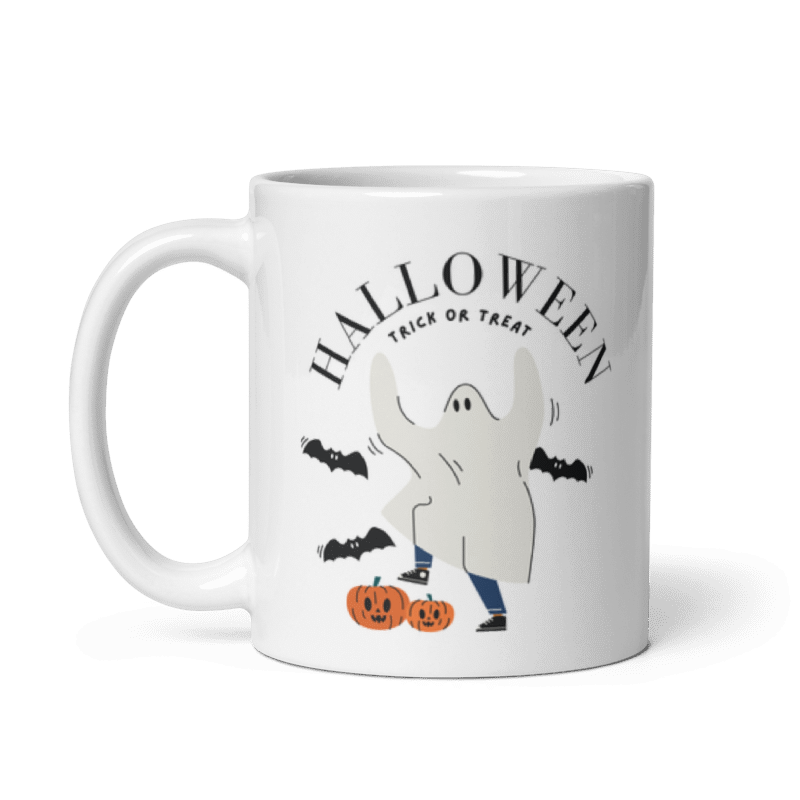 11 oz Hearthwood Market Mug front, person wearing a ghost costume smashing pumpkins with bats flying around them